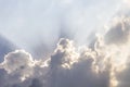 Clouds and sun shines through rays of light in the illuminated p Royalty Free Stock Photo