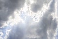 Clouds and sun shines through rays of light in the illuminated p Royalty Free Stock Photo