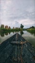 Clouds, sun , sky ,wind ,trees boat Royalty Free Stock Photo