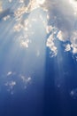 Clouds and sunbeam on blue sky