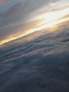 Clouds sunset storm sunrays sky Plane Royalty Free Stock Photo