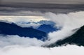 Clouds swirling around and above Carnic and Julian Alps