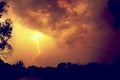 Clouds and thunder lightnings and storm on the dark cloudy sky Royalty Free Stock Photo