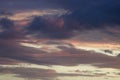 Clouds tinged with color in sky at sunset