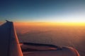 Clouds from the top and dramatic sunset, airplane view Royalty Free Stock Photo
