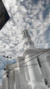 Clouds tower a mosque Royalty Free Stock Photo