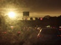 Clouds traffic motorway carlights Royalty Free Stock Photo