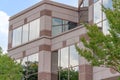 Clouds and trees reflection on corporate building Royalty Free Stock Photo