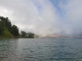 The clouds veiling the surroudings of the beautiful volcano lake