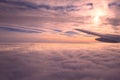 Clouds view from the airplane, Flying over the evening timelapse clouds with the late sun. Flight through moving cloudscape with Royalty Free Stock Photo