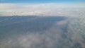 Clouds view from the airplane. Horizon Royalty Free Stock Photo