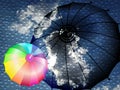 Clouds water drops and an umbrella with a rainbow umbrella. abstract vector illustration. Royalty Free Stock Photo