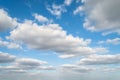 Clouds white soft in the vast blue sky.