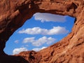 Clouds through Window Arch, Arches National Park, Utah