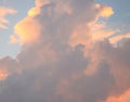 Cloudscape - Abstract Natural Background - Yellowish Orange and Dark Cumulonimbus Clouds in Blue Sky