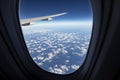Cloudscape against blue sky through air plane window Royalty Free Stock Photo