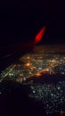 Cloudscape background from airplane with airplane wing. night time