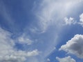 Cloudscape background with white distinctive cloud shapes and light blue sky Royalty Free Stock Photo