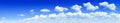 Cloudscape - Blue sky and white clouds Royalty Free Stock Photo