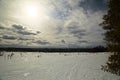 Cloudscape and breakable snow crust near Granbergsliden in Vasterbotten, Sweden