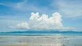 Low Angle View Of Clouds In Sky. Epic storm cloudscape. Soft sunlight, sun rays. Clear blue sky. Natural pattern, texture, Royalty Free Stock Photo