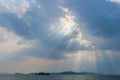 Low Angle View Of Clouds In Sky. Epic storm cloudscape. Soft sunlight, sun rays. Clear blue sky. Natural pattern, texture, Royalty Free Stock Photo