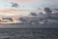 Cloudscape, Colored Clouds at Sunset near the Ocean, Background Royalty Free Stock Photo