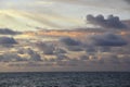 Cloudscape, Colored Clouds at Sunset near the Ocean, Background Royalty Free Stock Photo