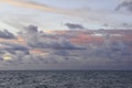 Cloudscape, Colored Clouds at Sunset near the Ocean, Background Royalty Free Stock Photo