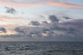 Cloudscape, Colored Clouds at Sunset near the Ocean on the Beach Royalty Free Stock Photo