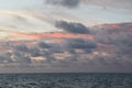 Cloudscape, Colored Clouds at Sunset near the Ocean on the Beach Royalty Free Stock Photo