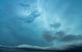 Cloudscape on dark blue sky. Blue sky and white fluffy clouds. Peaceful and tranquil background. Stormy sky. Nature background. Royalty Free Stock Photo