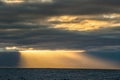 Cloudscape, Dramatic Clouds at Sunset near the Mountains in the Ocean Royalty Free Stock Photo