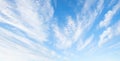 Cloudscape with fluffy cirrus and fleecy clouds