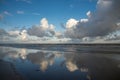 Cloudscape in the lonely sea beach. Royalty Free Stock Photo