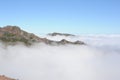 Cloudscape. Mountain range and peaks covered in clouds, fog and mist on Madeira Island , Portugal