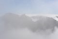 Cloudscape. Mountain range and peaks covered in clouds, fog and mist on Madeira Island , Portugal