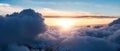 Cloudscape over the Canadian Mountains. Aerial Clouds Background Panorama Sunset Royalty Free Stock Photo