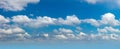 Cloudscape - Panorama of real blue sky during daytime with white light clouds Freedom and peace. Large photo format Royalty Free Stock Photo