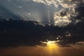 Cloudscape with the sun rays radiating from behind the cloud Royalty Free Stock Photo