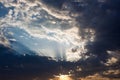 Cloudscape with the sun rays radiating from behind the cloud Royalty Free Stock Photo