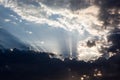 Cloudscape with the sun rays radiating from behind the cloud Royalty Free Stock Photo