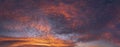 Cloudscape at sunset with red clouds on sky Royalty Free Stock Photo