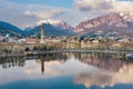 Cloudy aerial cityscape of Lecco town on spring evening. Picturesque waterfront of Lecco town located between famous Lake Como and Royalty Free Stock Photo