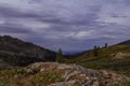 Cloudy alpine landscape with mountains and rocks in Altai