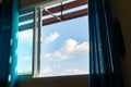 Cloudy blue sky outside the window Royalty Free Stock Photo