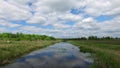 Cloudy blue sky.