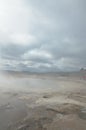 Cloudy landscape with steaming geysirs in Iceland Royalty Free Stock Photo