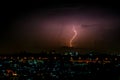 Cloudy with Bright lightning bolt strikes in the rural landscape of small city and satellite station Royalty Free Stock Photo