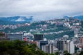 Cloudy Caracas city with the Avila at the background.